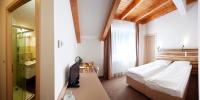Postel nebo postele na pokoji v ubytování Hotel Monínec