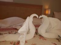 Postel nebo postele na pokoji v ubytování Glyfada Beach Hotel