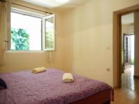 Postel nebo postele na pokoji v ubytování Apartments Maja 221