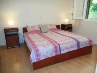 Postel nebo postele na pokoji v ubytování Apartments Maja 221