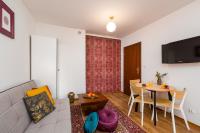 Televízia a/alebo spoločenská miestnosť v ubytovaní Sleepway Apartments - Orient Dream