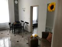Posezení v ubytování Sunflowers Apartman