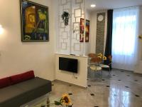 TV a/nebo společenská místnost v ubytování Sunflowers Apartman