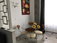 Posezení v ubytování Sunflowers Apartman