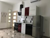 Kuchyň nebo kuchyňský kout v ubytování Sunflowers Apartman