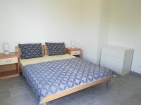 Postel nebo postele na pokoji v ubytování Villa Adagio Apartments