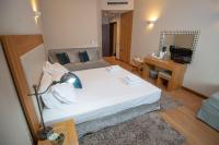 Posteľ alebo postele v izbe v ubytovaní Anavasi Mountain Resort