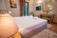 Posteľ alebo postele v izbe v ubytovaní Anavasi Mountain Resort
