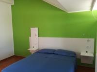 Posteľ alebo postele v izbe v ubytovaní B&B Villa Napoli