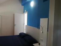 Posteľ alebo postele v izbe v ubytovaní B&B Villa Napoli