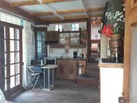 A kitchen or kitchenette at VLASSIS APTS -ΜΕΛΙΔΟΝΙ-ΔΙΑΜΕΡΙΣΜΑ ΒΑΣΙΛΙΚΗ