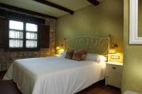 Postel nebo postele na pokoji v ubytování Casas Rurales Los Ánades