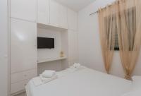 Posteľ alebo postele v izbe v ubytovaní Modern Apartman Pjero