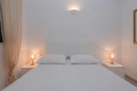 Posteľ alebo postele v izbe v ubytovaní Modern Apartman Pjero