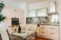 Kuchyň nebo kuchyňský kout v ubytování Nobless Apartment Brno