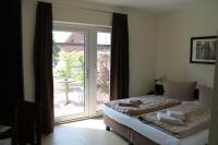 Postel nebo postele na pokoji v ubytování Usedom Bike Hotel & Suites