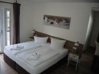 Postel nebo postele na pokoji v ubytování Usedom Bike Hotel & Suites