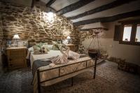 Postel nebo postele na pokoji v ubytování Casa Rural "El Olivo"
