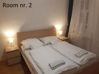 Posteľ alebo postele v izbe v ubytovaní Zoli Apartmanok-Zoli Kölcsey 19 Villa