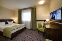 Posteľ alebo postele v izbe v ubytovaní Aparthotel Lumen