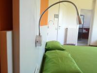 Posteľ alebo postele v izbe v ubytovaní B&B Villa Napoli