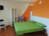 Posteľ alebo postele v izbe v ubytovaní B&B Villa Napoli