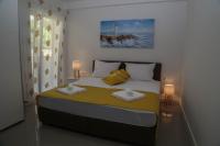 Posteľ alebo postele v izbe v ubytovaní Apartments Paradise Hvar
