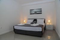 Posteľ alebo postele v izbe v ubytovaní Apartments Paradise Hvar