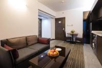 广州友和酒店Yuwa Hotel-Free Shuttle Bus to Canton Fair Complex DuringCanton Fair Periodにあるテレビまたはエンターテインメントセンター