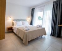Posteľ alebo postele v izbe v ubytovaní The PAPOUTSAKIS apartments