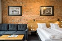 Łóżko lub łóżka w pokoju w obiekcie Loft Apartments Poznań