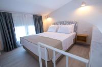 Posteľ alebo postele v izbe v ubytovaní The PAPOUTSAKIS apartments