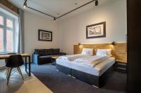 Łóżko lub łóżka w pokoju w obiekcie Loft Apartments Poznań