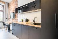 Kuchnia lub aneks kuchenny w obiekcie Loft Apartments Poznań