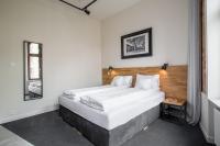 Łóżko lub łóżka w pokoju w obiekcie Loft Apartments Poznań