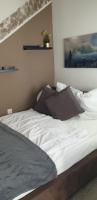 Postel nebo postele na pokoji v ubytování Hahnenklee Ferienpark 7-611