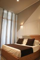 Posteľ alebo postele v izbe v ubytovaní Be Italian Flat Piazza Bovio 22