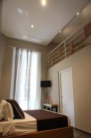 Posteľ alebo postele v izbe v ubytovaní Be Italian Flat Piazza Bovio 22