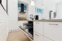 Kuchyňa alebo kuchynka v ubytovaní Apartments Gdańsk Starowiejska by Noclegi Renters