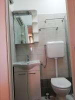 Een badkamer bij APARTMAN LU&Scaron;ETI&#x106;