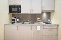 Kuchyň nebo kuchyňský kout v ubytování Appartement-Hotel an der Riemergasse