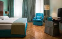 Postel nebo postele na pokoji v ubytování Appartement-Hotel an der Riemergasse