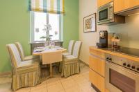 Kuchyň nebo kuchyňský kout v ubytování Appartement-Hotel an der Riemergasse