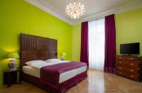 Postel nebo postele na pokoji v ubytování Appartement-Hotel an der Riemergasse