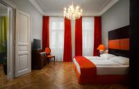 Postel nebo postele na pokoji v ubytování Appartement-Hotel an der Riemergasse