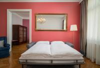 Postel nebo postele na pokoji v ubytování Appartement-Hotel an der Riemergasse