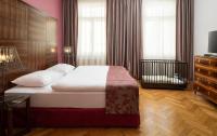 Postel nebo postele na pokoji v ubytování Appartement-Hotel an der Riemergasse