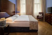 Postel nebo postele na pokoji v ubytování Appartement-Hotel an der Riemergasse