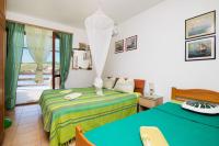 Posteľ alebo postele v izbe v ubytovaní Apartment Sanka
