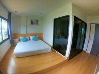 Postel nebo postele na pokoji v ubytování Klongrien Boutique Hotel